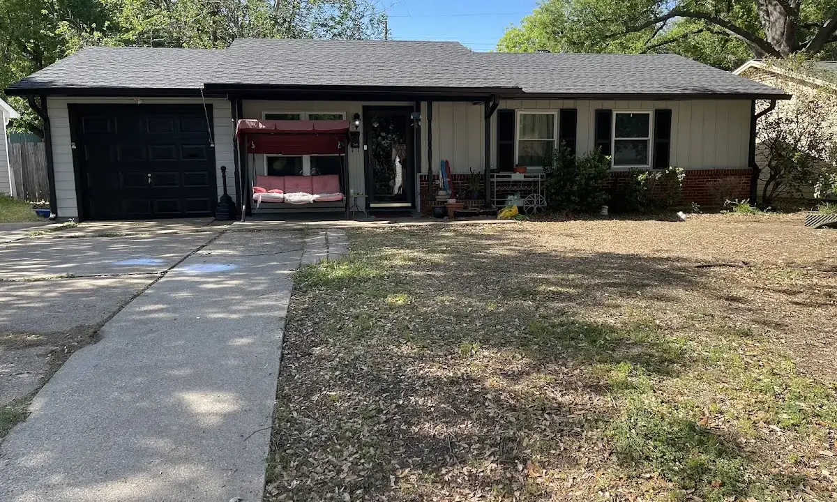 Asphalt Shingle Roof Repair crew at work on a residential roof in Hazel Crest
